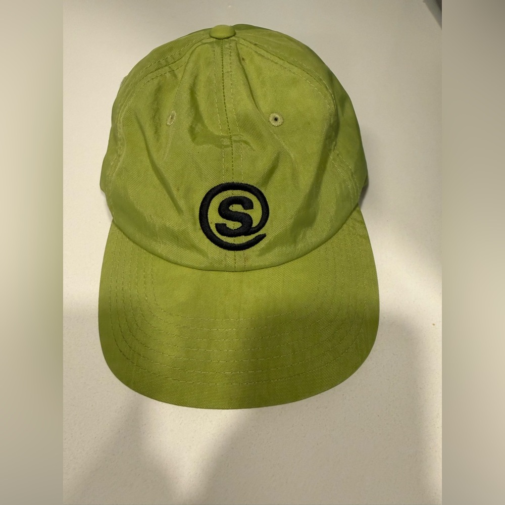 Green Baseball Cap with Black 'S' Logo